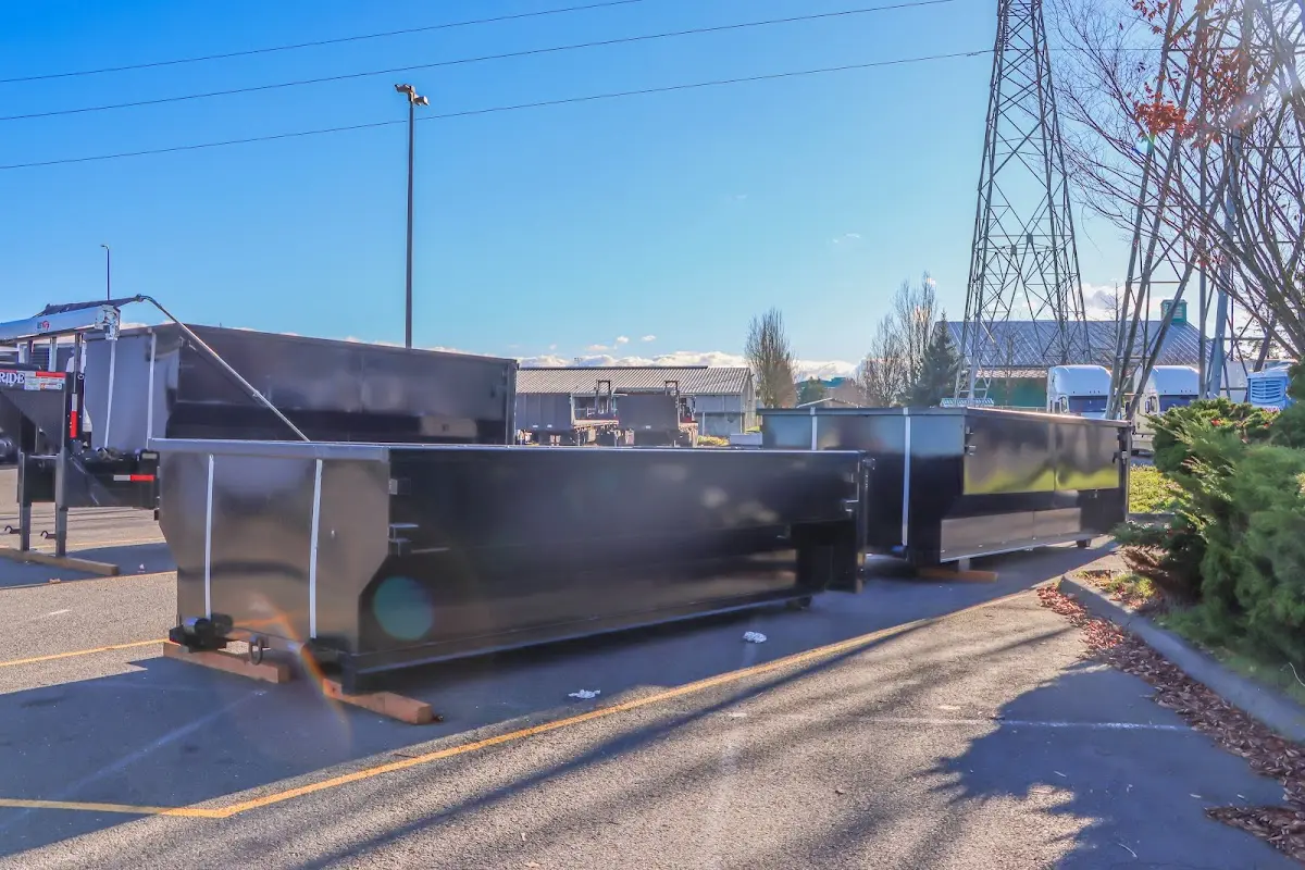 Roll-off dumpster ready for waste disposal at job site for 2 Yard Dumpster Rental in Greenbrier